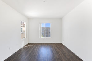 bright living area with wood floors
