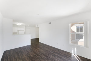 bright living area with wood floors
