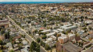 Aerial view of St. Johns Manor and city of Costa Mesa, photo taken on a sunny day