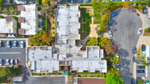 Aerial Exterior, Top down view, meticulous landscaping, parking out front.